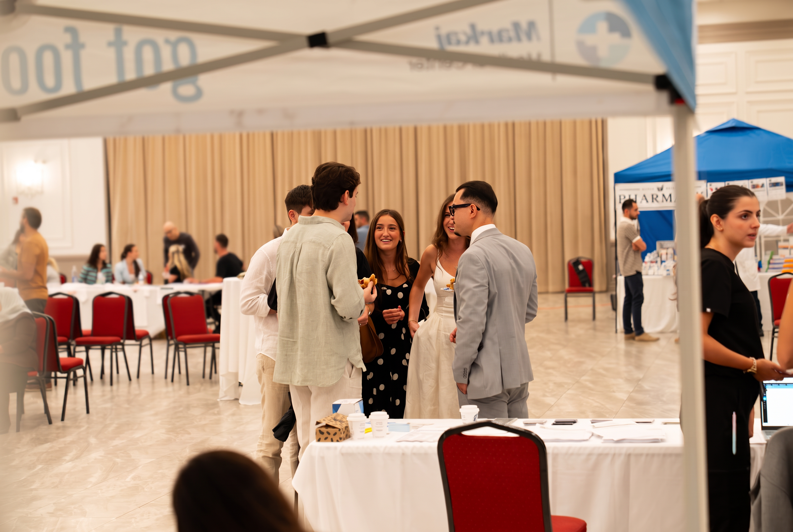 Guests connecting between health fair stations