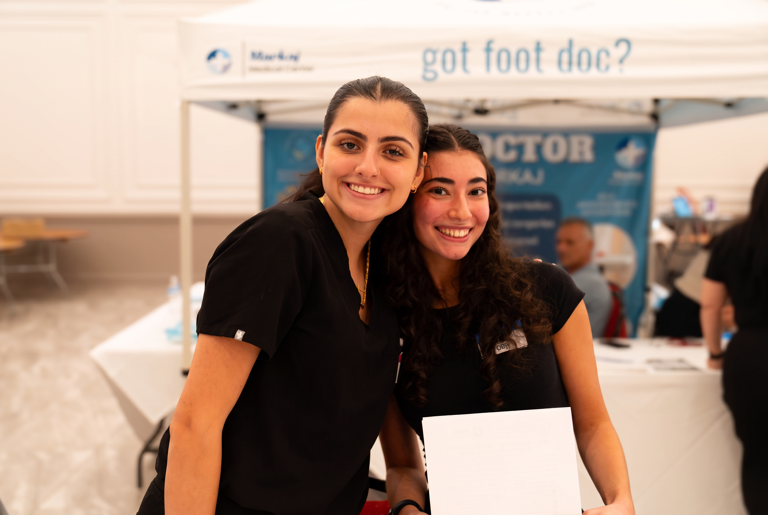 Student volunteers helping at the health fair