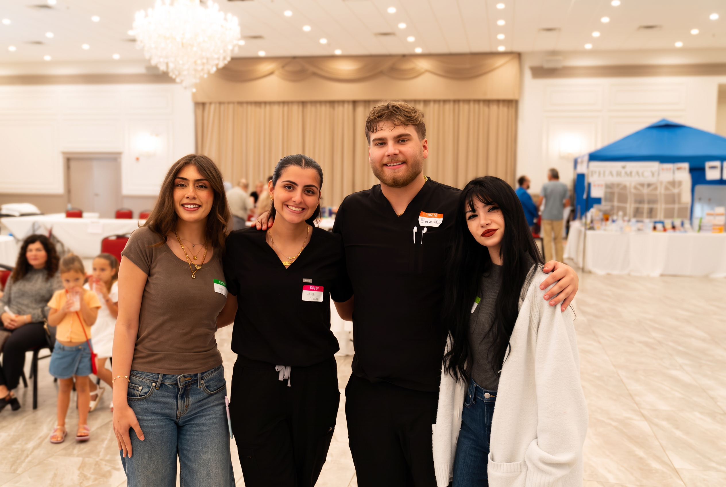 Volunteers near the pharmacy tent